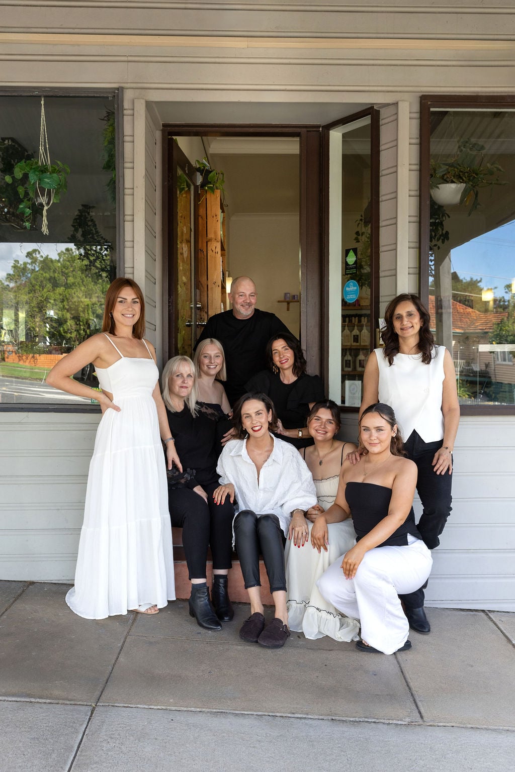 The Krop Hair team of stylists outside the salon entrance in Norman Park, Brisbane