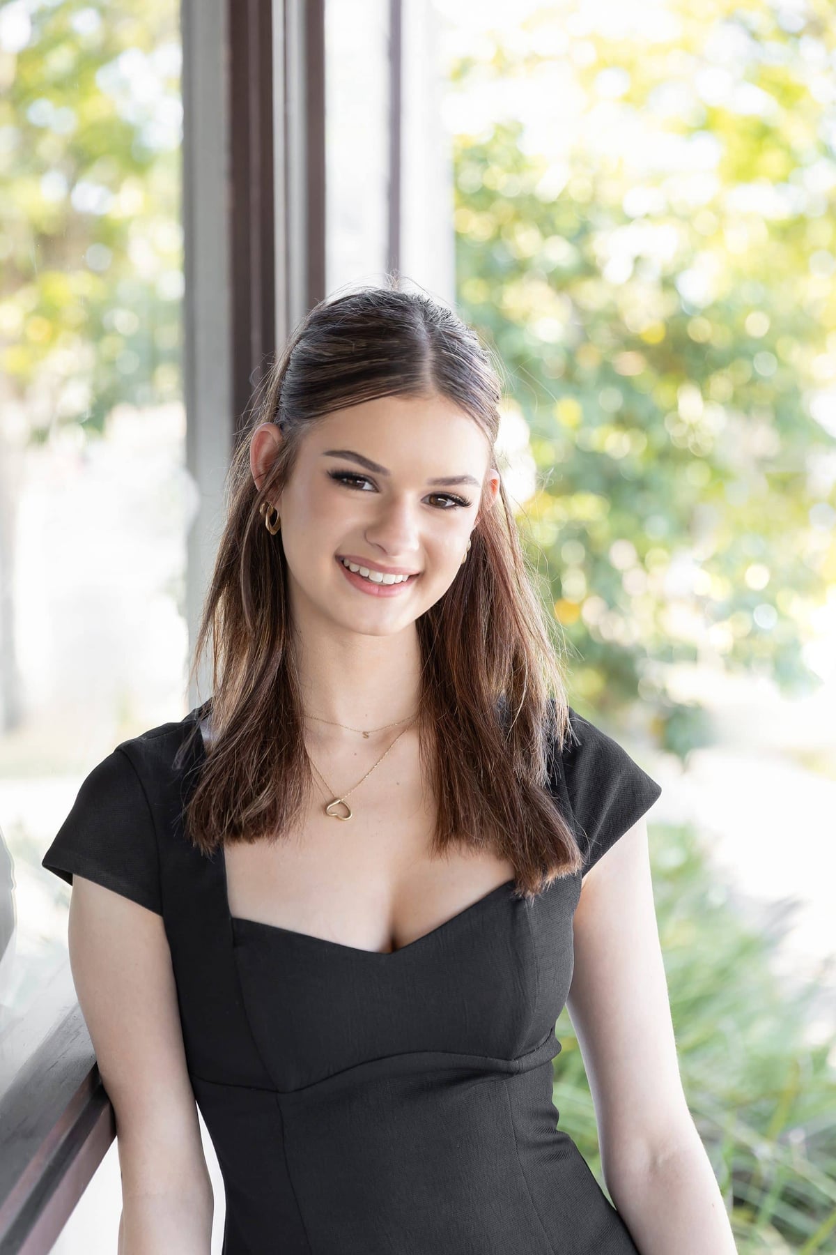 Sienna, Emerging Stylist at Krop Hair salon in Norman Park
